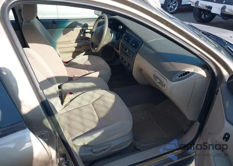 2002 Ford Taurus Se z USA, uszkodzony, nr VIN 1FAFP53U12A201989